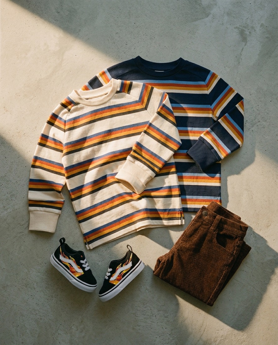 Two striped long sleeves, cream over navy, in window light